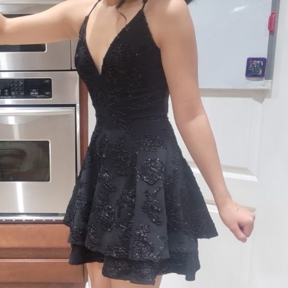 A-line black open back homecoming top